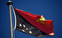 Papua New Guinea flag raised on a flag pole